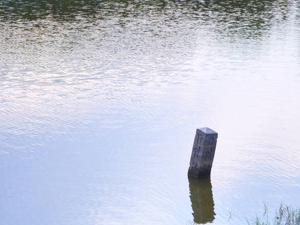 Pole reflect in the water silence concept