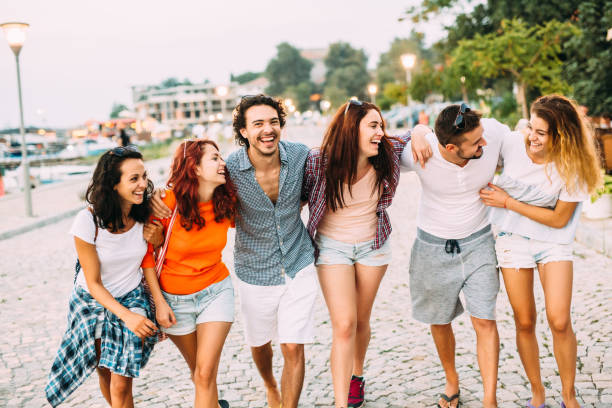 istock Friends taking a walk by the harbour 686171228