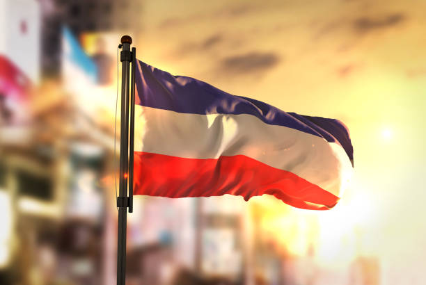 istock Los Altos Flag Against City Blurred Background At Sunrise Backlight 686175342