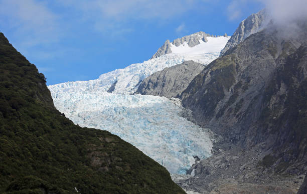istock Franz Josef glacier and blue sky 686179148
