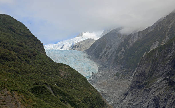 istock Helicopter flying over Franz Josef glacier 686181820