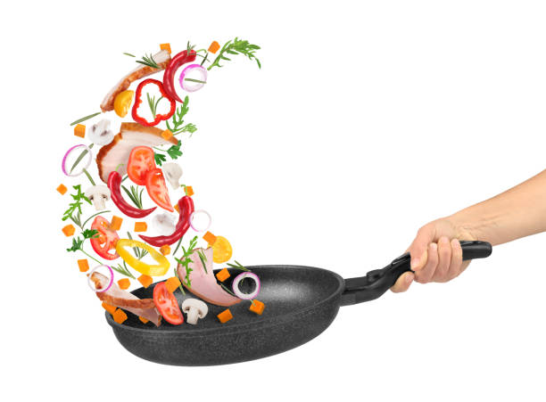 istock flying  salad with meat on pan 686182310