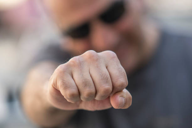 istock Man making clenched fist at camera. Selective focus 686184366