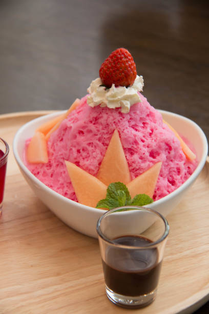 istock bingsu with strawberry and sauce 686187556