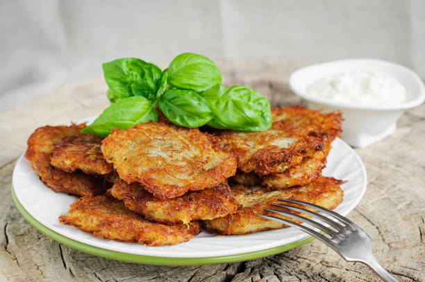 istock Fried potato pancakes with basil leaves 686188226