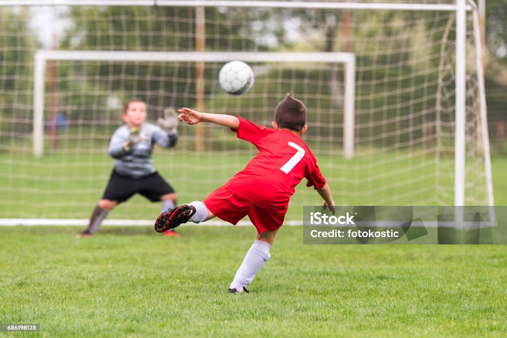 Kids soccer football - young children players match on soccer field Soccer Stock Photo