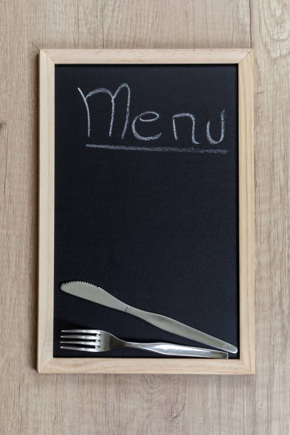 istock Black chalkboard with wooden frame. 686198142