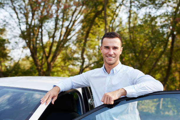 istock Man leaning on car door 686202066