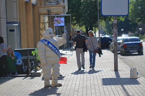 Pyatigorsk, Russia - May 9, 2017: The man in the suit of a Bibendum on the street. Bibendum (Michelin Man) is a symbol of the Michelin tire company. Advertising in Pyatigorsk
