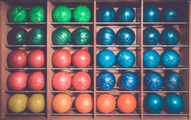 istock Bowling balls in the rack, sorted by size and color 686208792