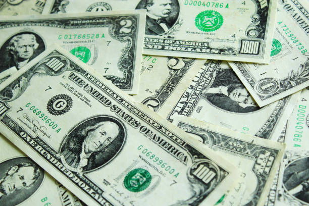 istock background of dollar bank notes 686212198