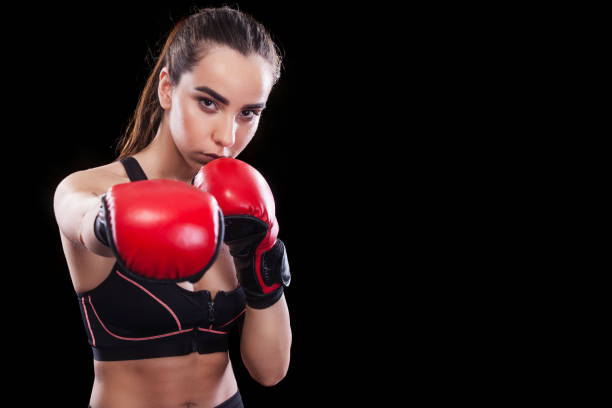 istock Sportsman muay thai boxer fighting. Isolated on black background. Copy Space. 686214840