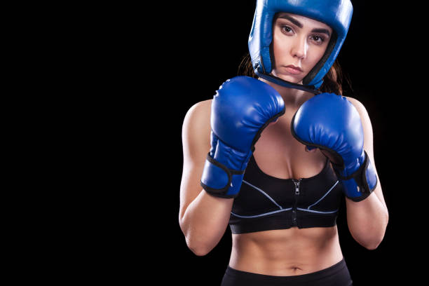 istock Sportsman muay thai boxer fighting. Isolated on black background. Copy Space. 686214982