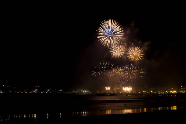 istock Golden fireworks at the beach. 686225046