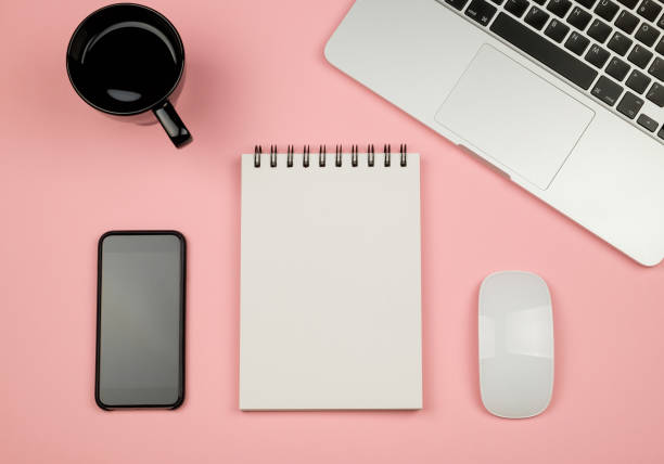istock Creative design mockup set of workspace desk with notebook. Copy space colored background 686233896