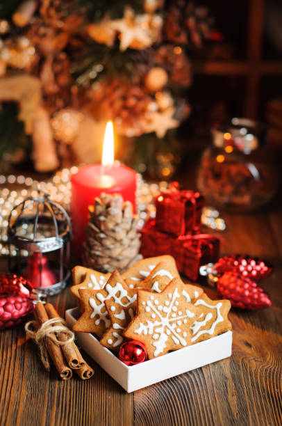 istock Christmas cookies with decorations on wooden table 686234790
