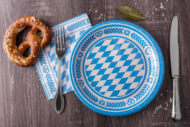 Empty bavarian plate with pretzel stock photo