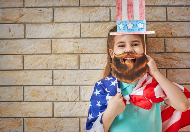 istock girl with American flag 686254770