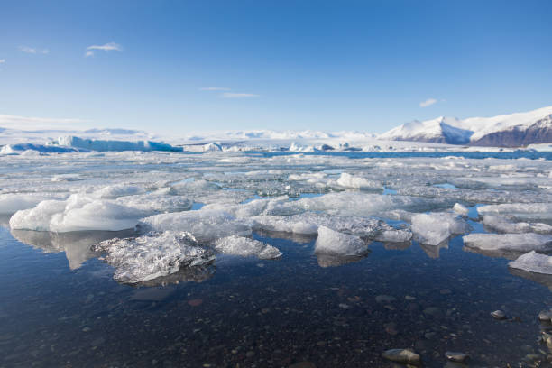 istock Natural winter lake ice breaking with clear sky background 686271188