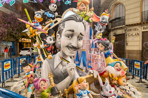 Valencia, Spain – March, 18, 2013: Las Fallas, papermache models are displayed during traditional celebration in praise of St Joseph. Celebration is annual. This falla is from Valencia city, and its theme is about Walt Disney.
