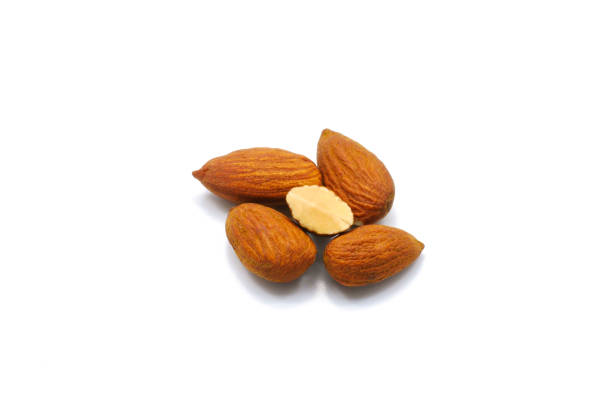 istock Group of roast almonds isolated on white background 686275452
