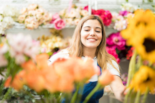 istock Florist organizing her product display 686278298