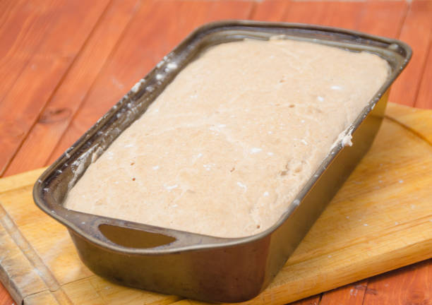 istock on the table the dough to the baking pan 686281760