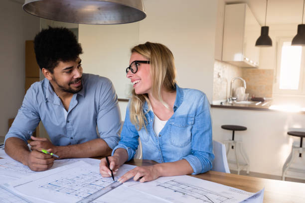 istock Business People and architects working on project together 686284678