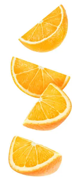 Isolated orange wedges. Four falling pieces of orange fruit isolated on white background with clipping path