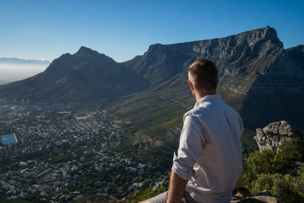 istock Young man contemplating view on mountain top 686289136