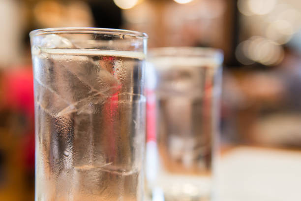 istock A glass of ice and drinking water on blur background. 686301712