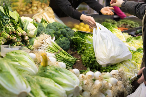 istock Buying fresh vegetables at the marketplace 686312544