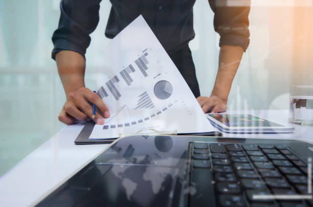 istock Businessman working at office. Digital tablet laptop computer smart phone 686321252