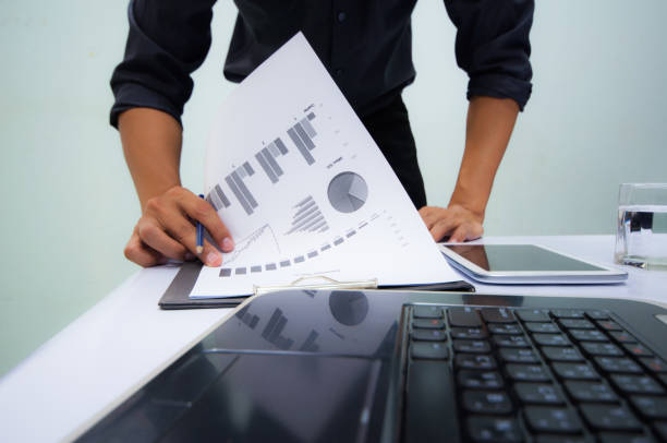 istock Businessman working at office. Digital tablet laptop computer smart phone 686321872