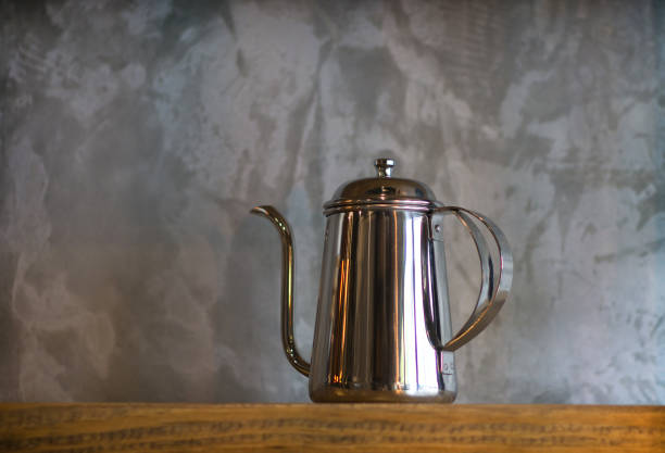 istock Silver coffee pots on wood shelf for home interior. 686326292