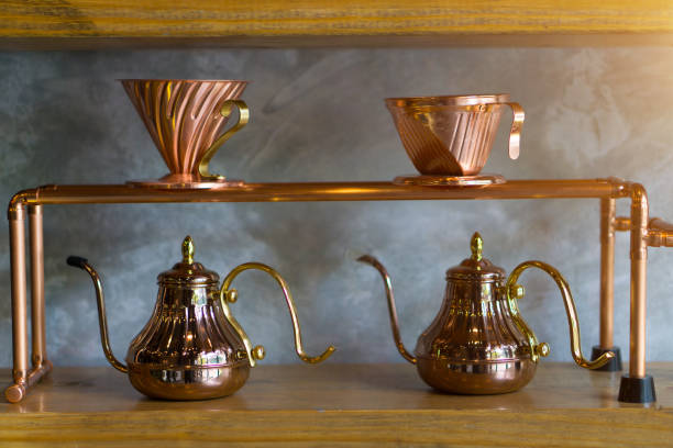 istock Metal copper coffee dripers and kettle 686326400