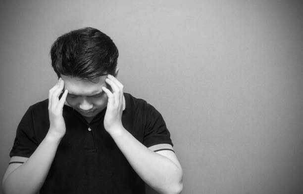 istock Portrait of a stressed man  having a headache 686337578