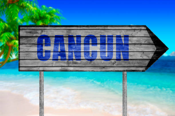 istock Cancun wooden sign with beach background 686344656