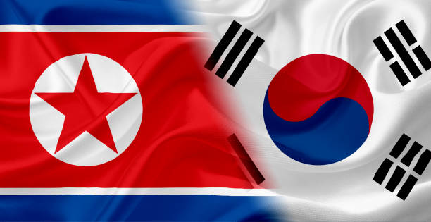 istock Waving flag of North Korea and South Korea, with fabric texture 686359612