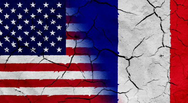 istock USA and France flag together, with dried soil texture 686359958