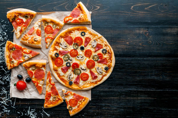 istock Hot Homemade Pepperoni Pizza Ready to Eat. natural light 686360748