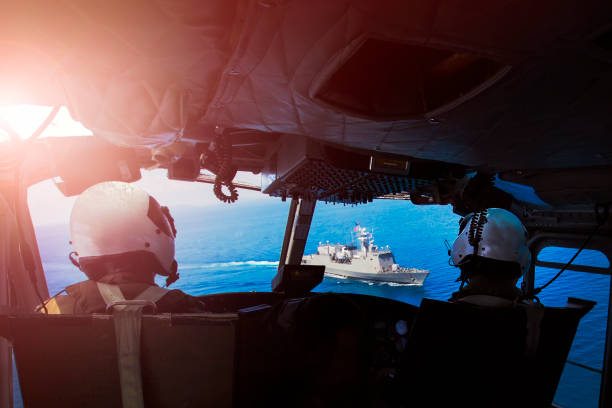 istock Military pilot soldier on helicopter 686376342