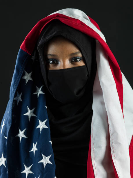 istock young black muslim woman 686379646