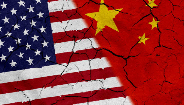 istock USA and China flag, with dried soil texture 686383428