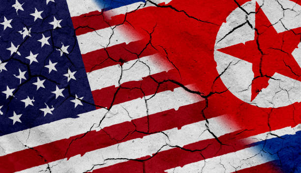 istock USA and North Korea flag, with fabric texture 686383440