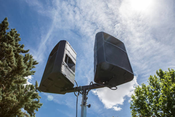 istock Outdoor speakers over leaf and blue cloudy sky 686383478