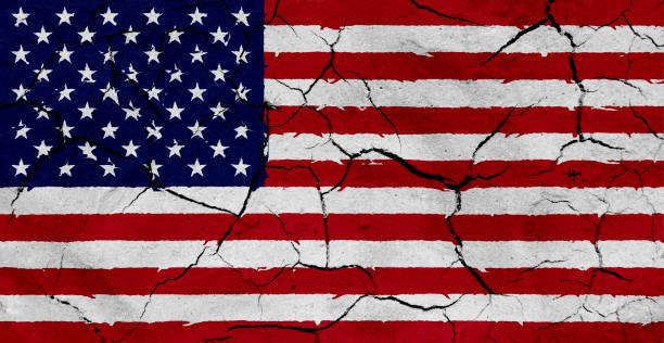 istock Flag of USA with dried soil texture 686387096