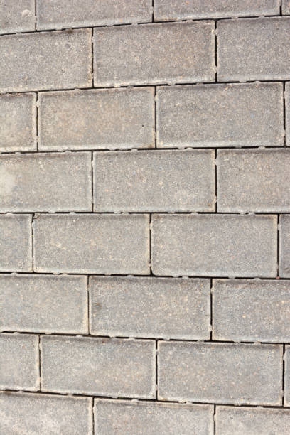 istock Wall of gray brick, paving slab. Unusual background 686403764