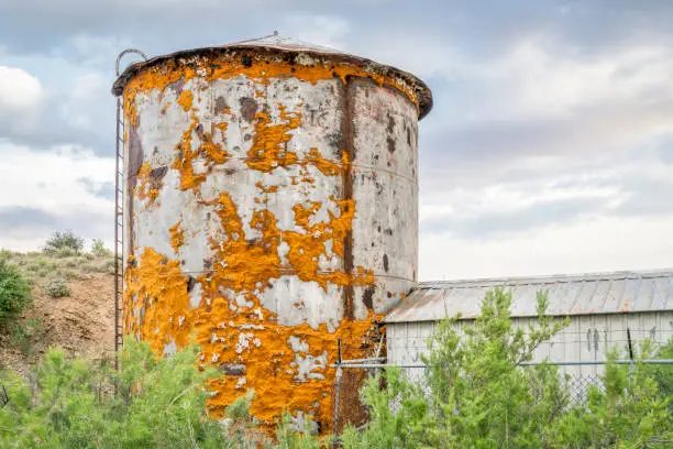 old water tank covered by lichen near Thompson Springs at Book Cliffs in eastern Utah