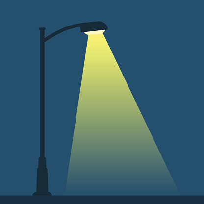 Streetlight lamp post on dark background with spotlight. Simple vector illustration of night street.